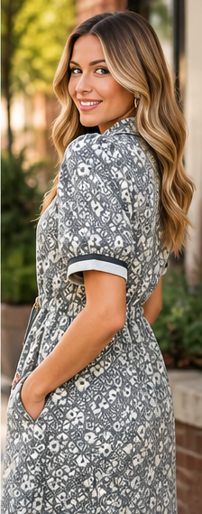 a grey textured dress from Umgee with side details on a model