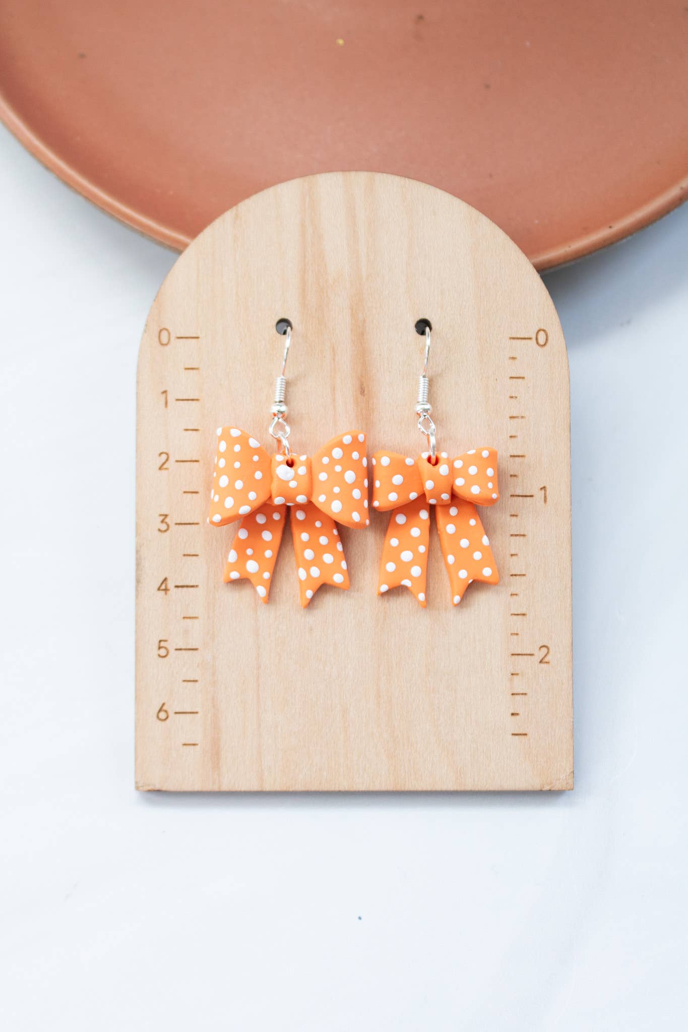 Vols Orange & White Polka Dot Bow Earrings