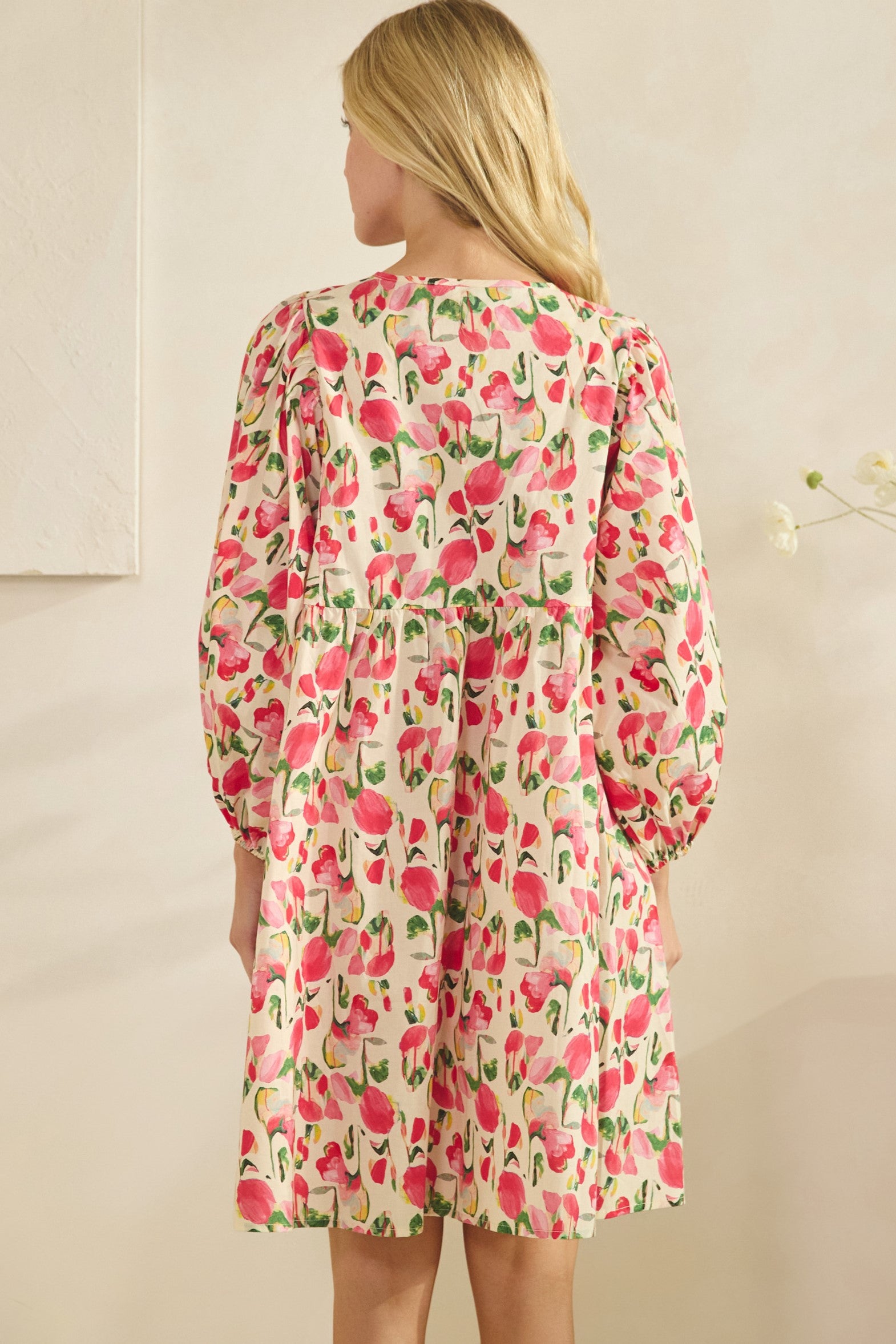 floral mini dress with long sleeves and elastic cuffs