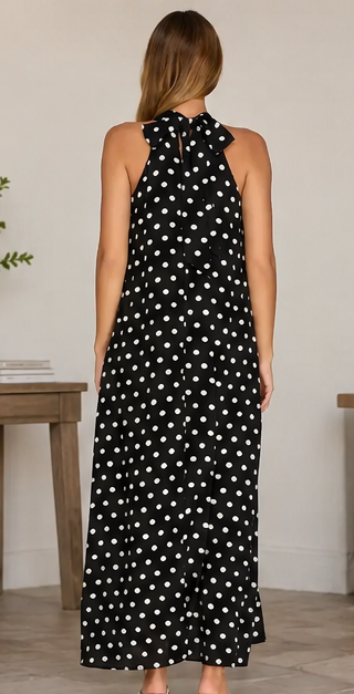 Black polka dot dress shown from multiple angles with text 'polka dot perfection' at the bottom.