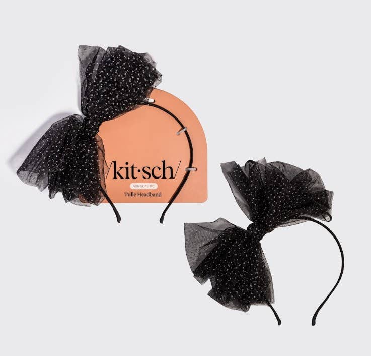 Two black tulle headbands with small white polka dots are shown on a light gray background. One headband is attached to a peach-colored display card with the brand name 'kit-sch' visible, and the other is shown loose.