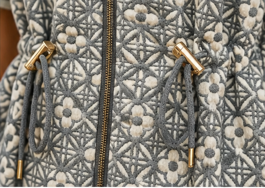 drawstring detail of a grey textured dress from Umgee