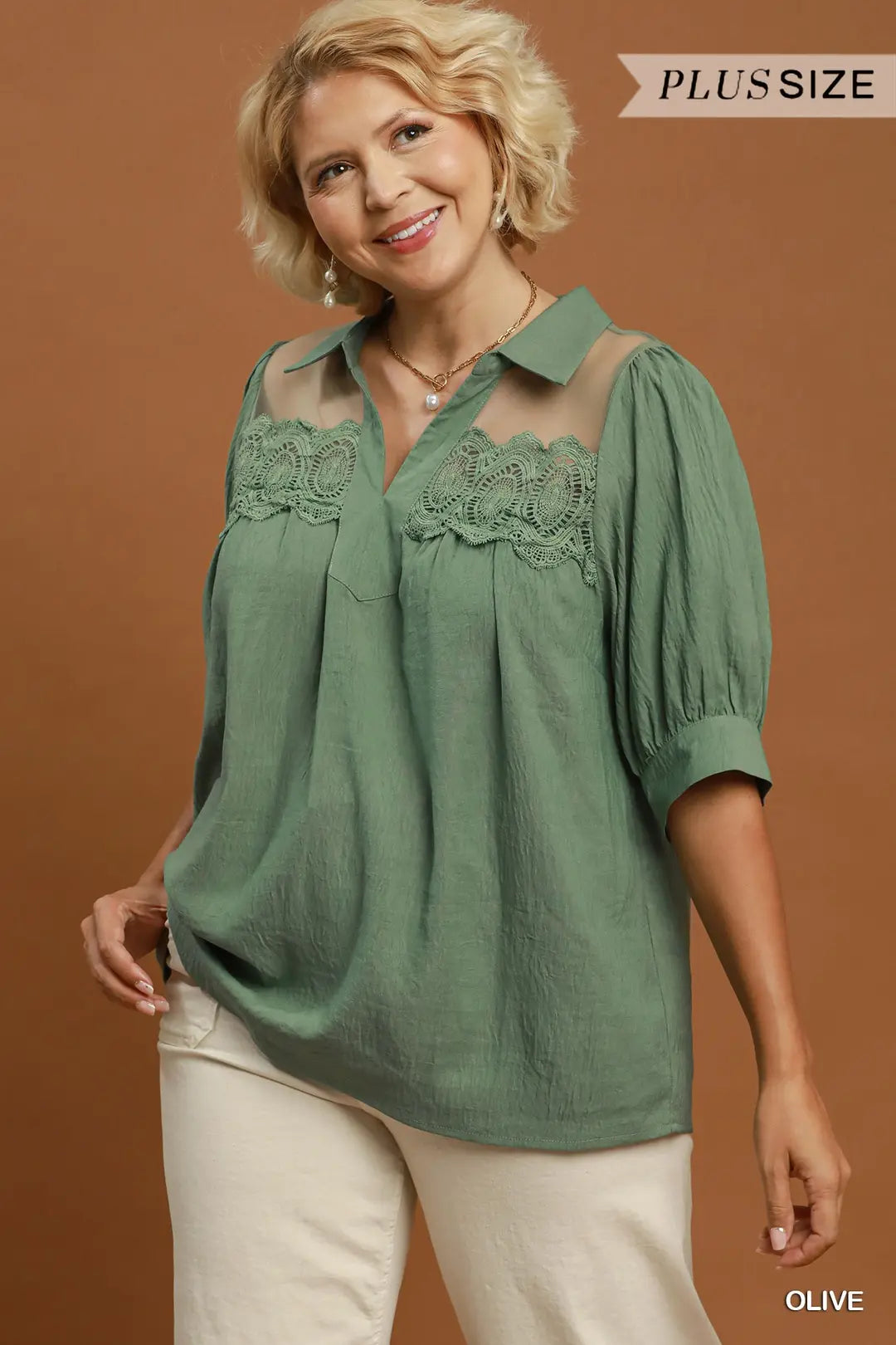 Umgee olive lace detail puff sleeve blouse styled with jeans