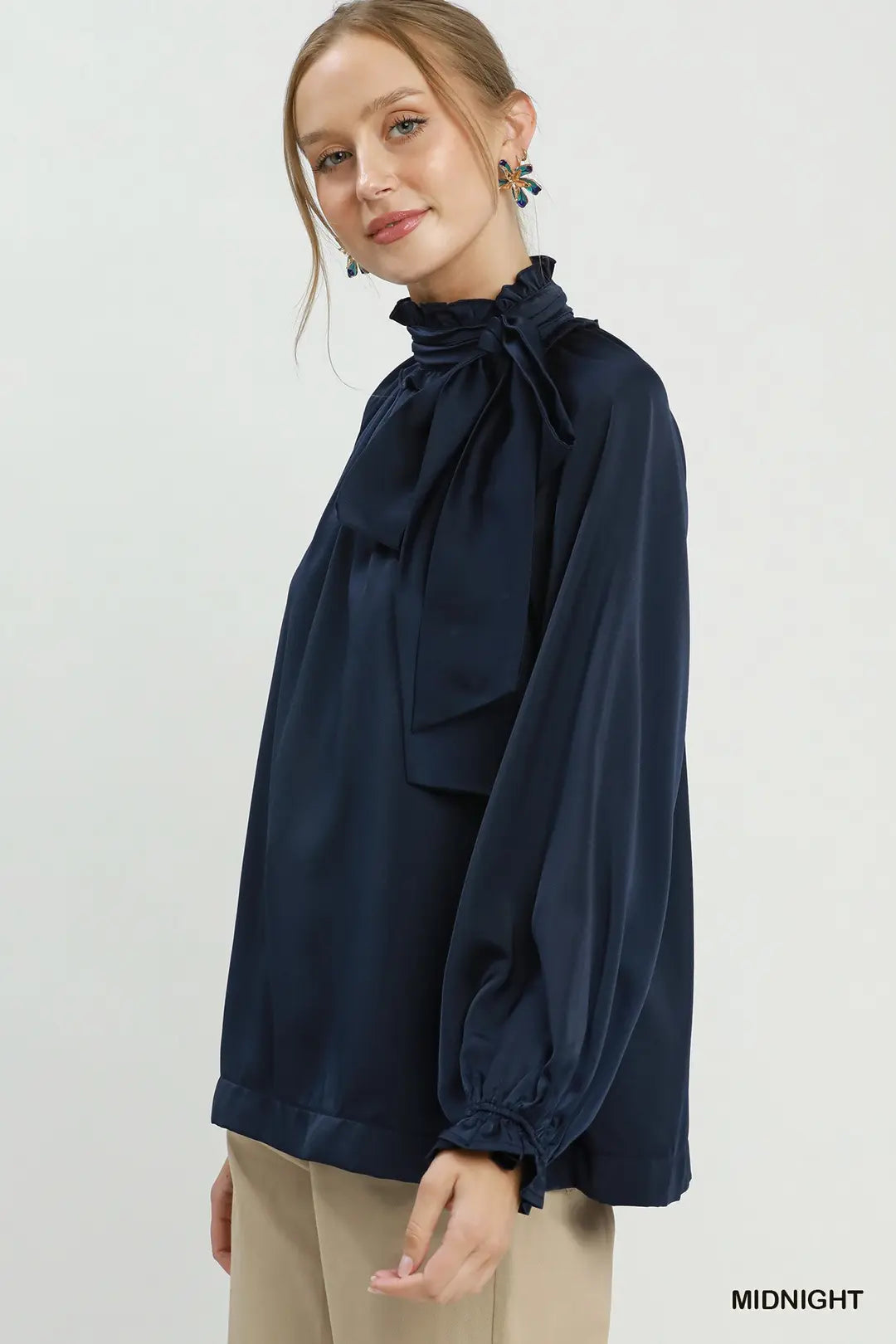 Umgee satin tie-neck ruffle blouse in midnight navy, sleeve and cuff detail