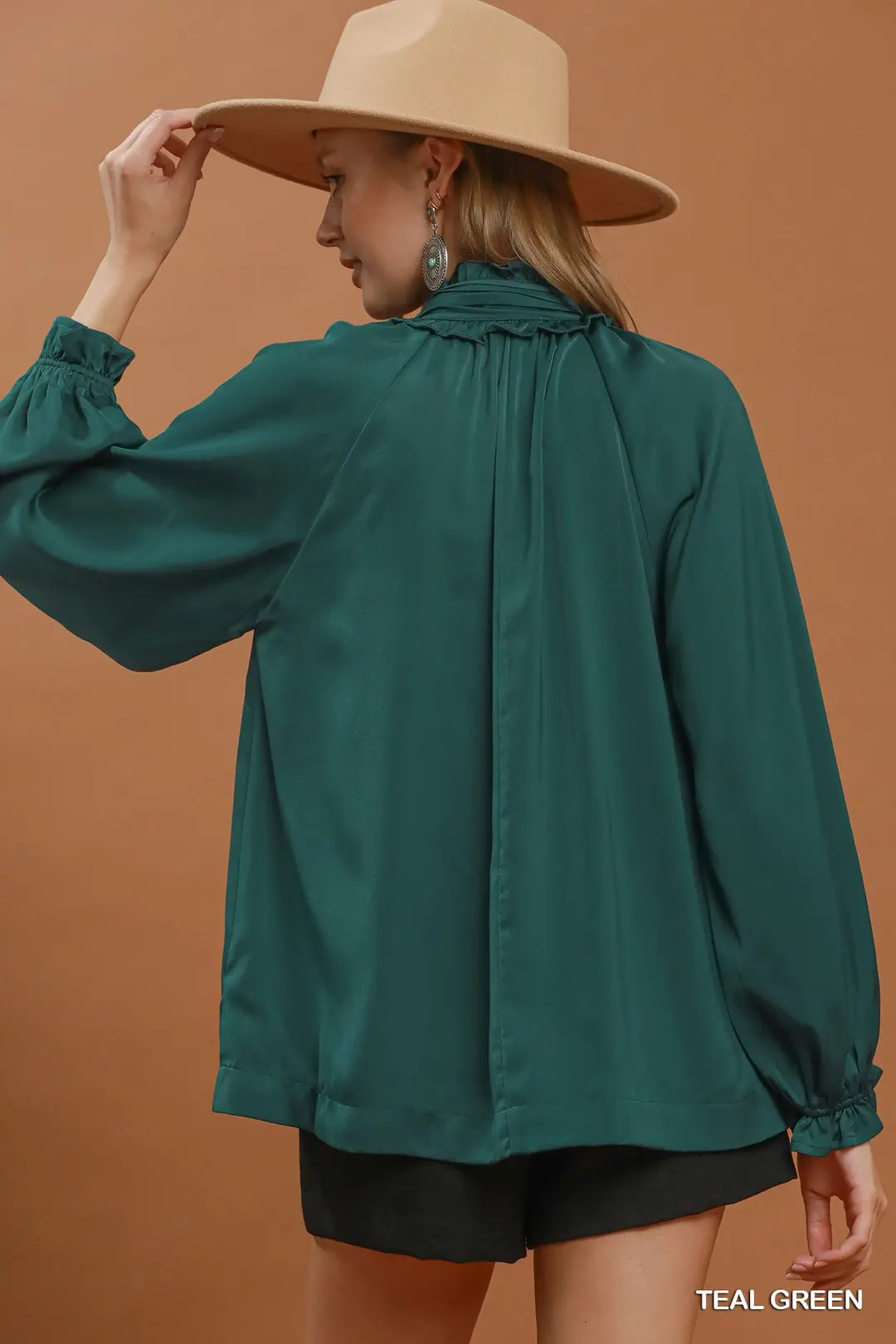 Umgee satin tie-neck ruffle blouse in teal green, back view