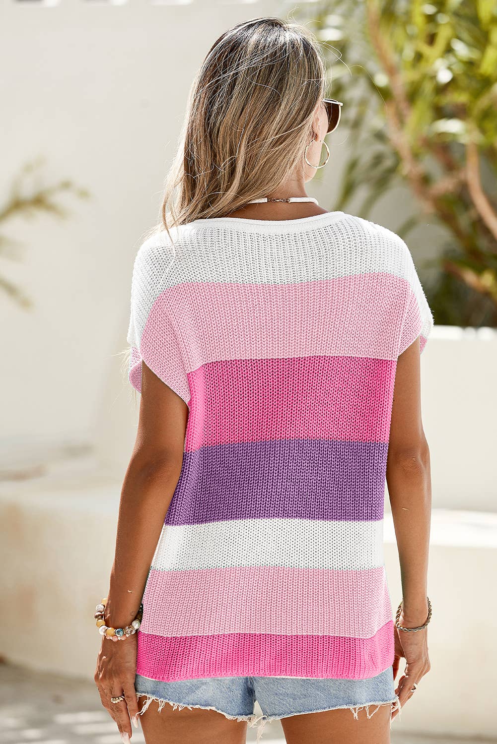 short sleeve color block sweater top styled with denim shorts