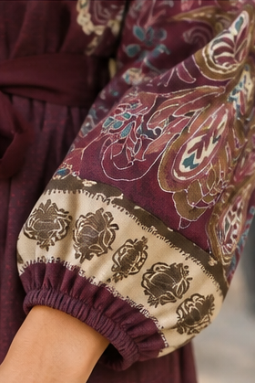 Plum boho midi dress with paisley floral print, tie waist and contrast border detailing