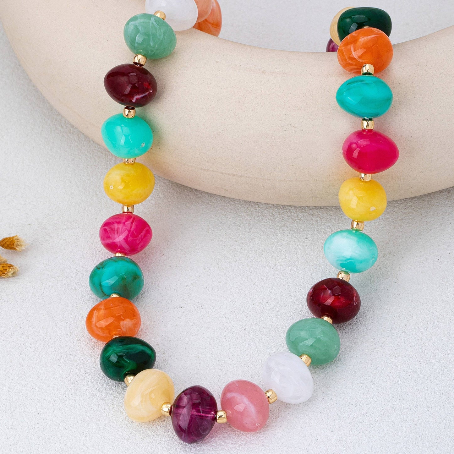 Rainbow resin bead necklace with gold accents