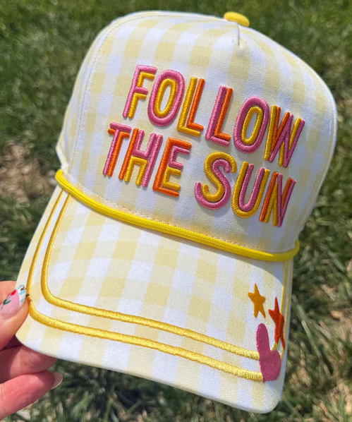 follow the sun yellow and pink trucker hat
