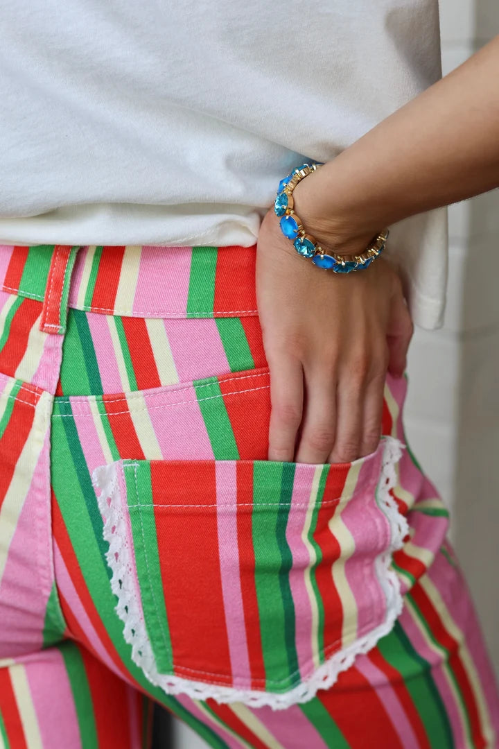 Woman wearing Poppy & Pine Candy Stripe Denim wide leg jeans with a white top