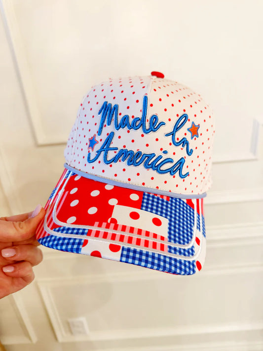 White patriotic trucker hat with red polka dots and Made In America embroidery with patchwork red white and blue brim