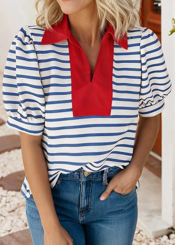 Front view of relaxed fit blue striped boutique top with short sleeves and red neckline