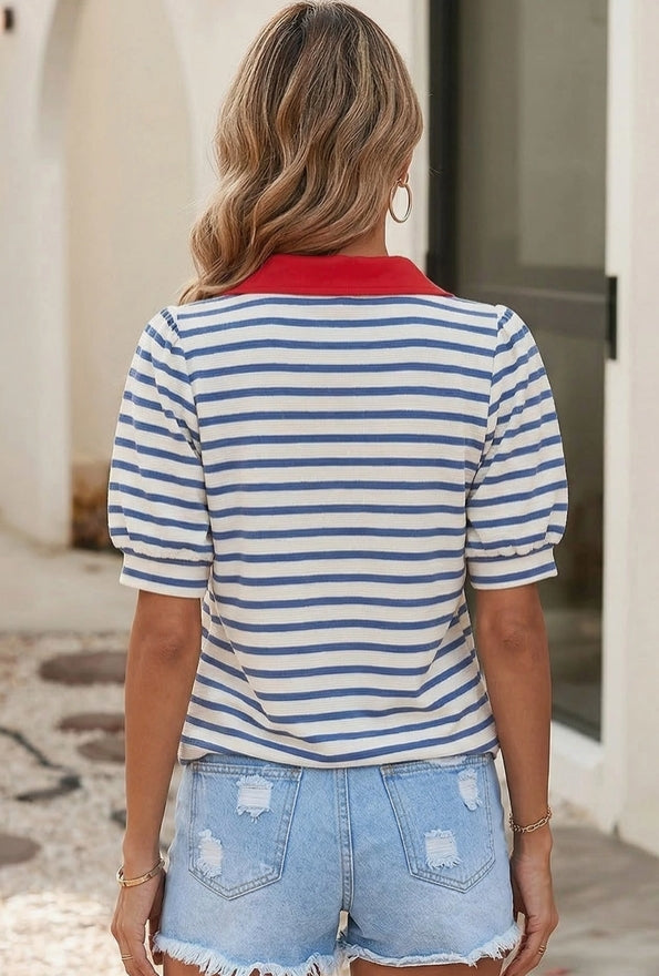Back view of blue striped casual women’s top with relaxed silhouette