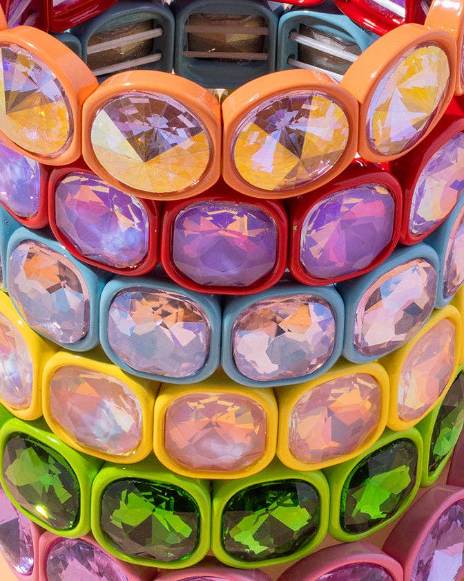 Colorful transparent cube with embedded colorful beads