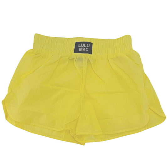 Yellow athletic shorts with 'Lulu Mac' label on a white background
