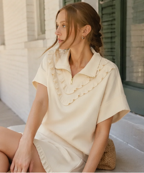 Woman wearing a cream-colored outfit in various outdoor settings.