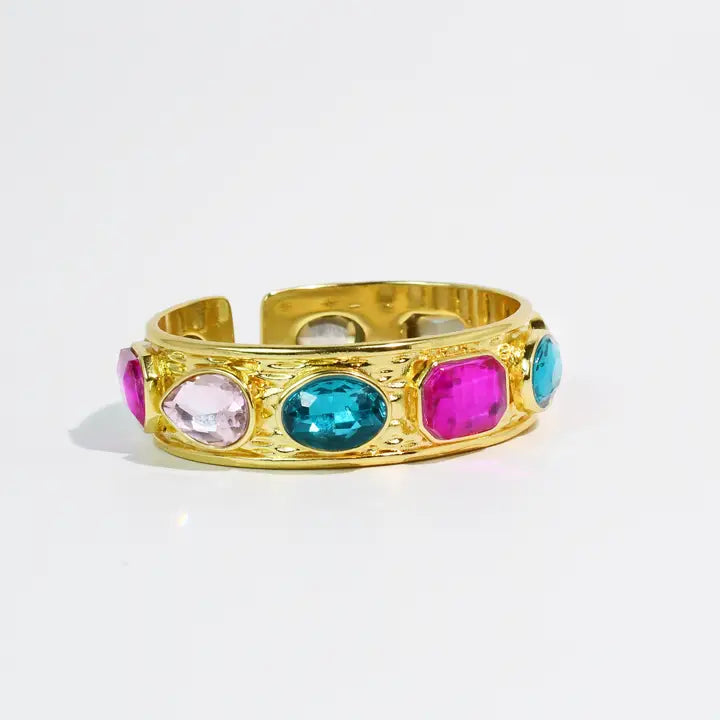 Treasure Jewels Multi Glow colorful crystal gold cuff bracelet on white background