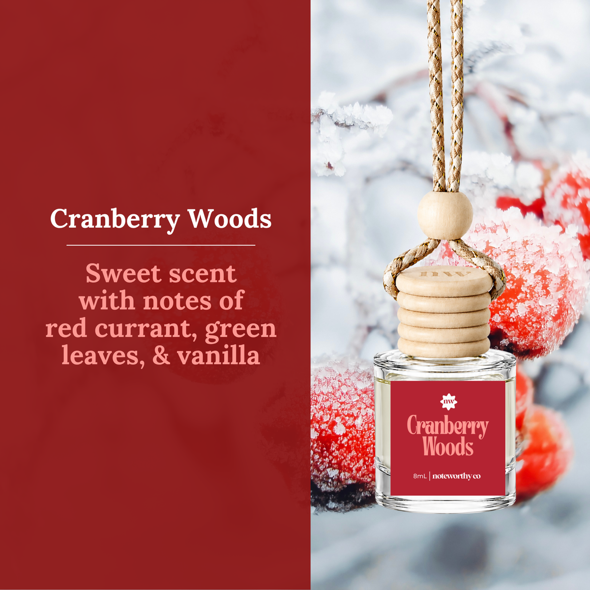 Cranberry Woods diffuser bottle with a wooden stopper and braided cord, shown on the right against a snowy winter background with red berries. The left side has a dark red text panel describing the scent notes.