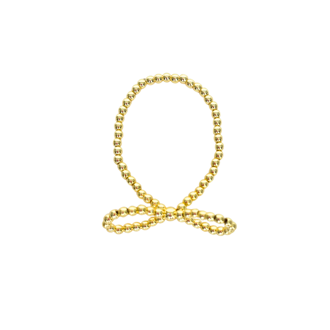 Gold chain necklace on a white background