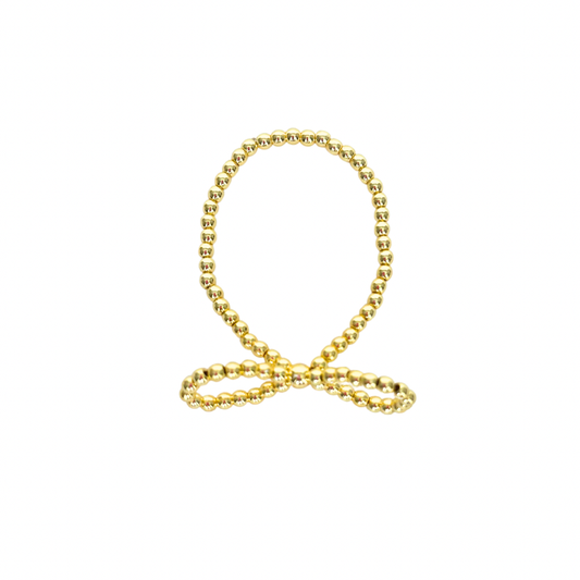 Gold chain necklace on a white background