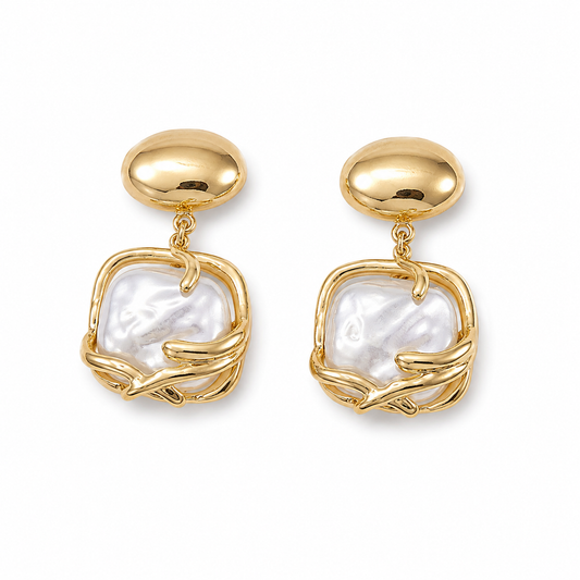 Golden Pearl statement drop earrings with sculptural gold-tone setting