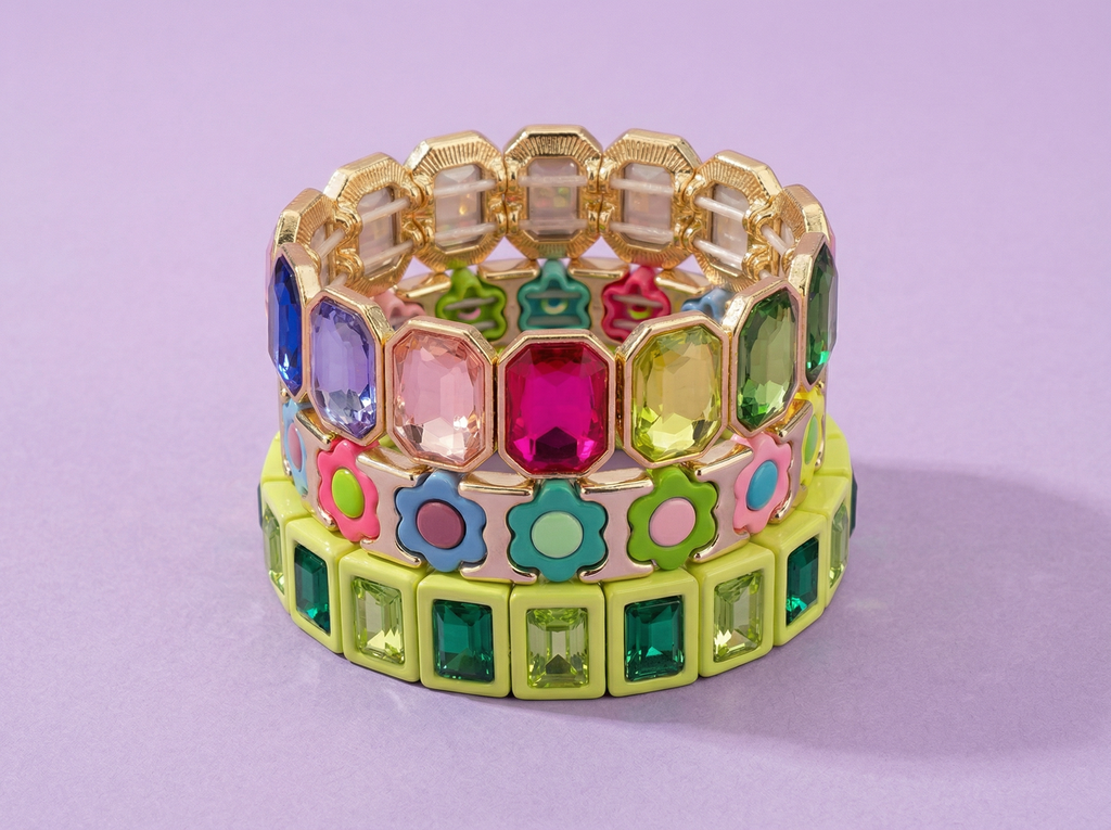 Colorful gemstone bracelet on a light purple background