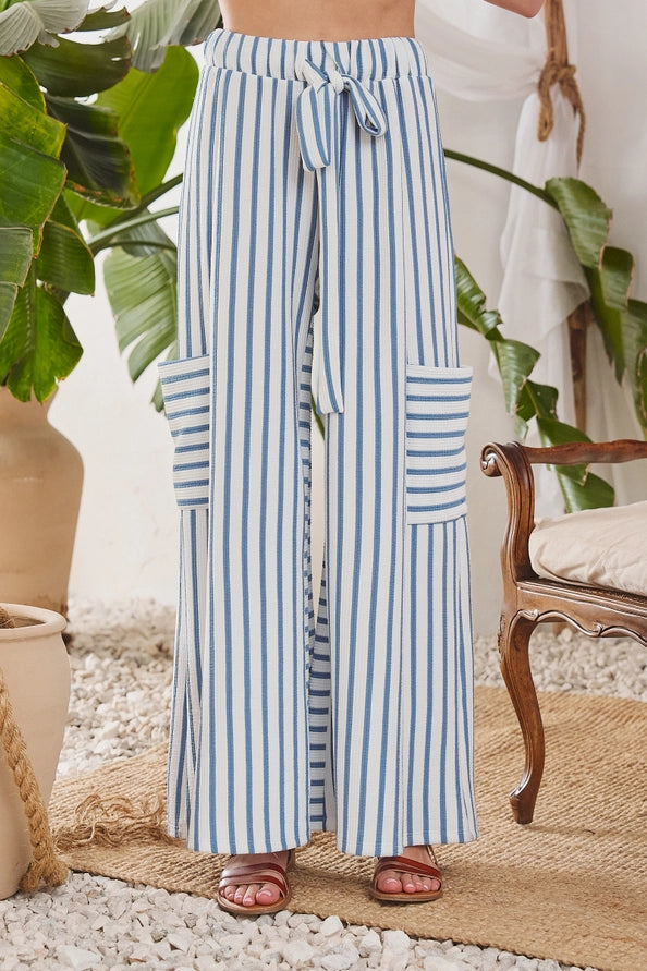 Striped wide-leg pants in indigo/cream, front view with tie waist bow
